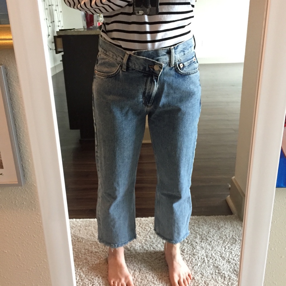 Asymmetric button fly jeans